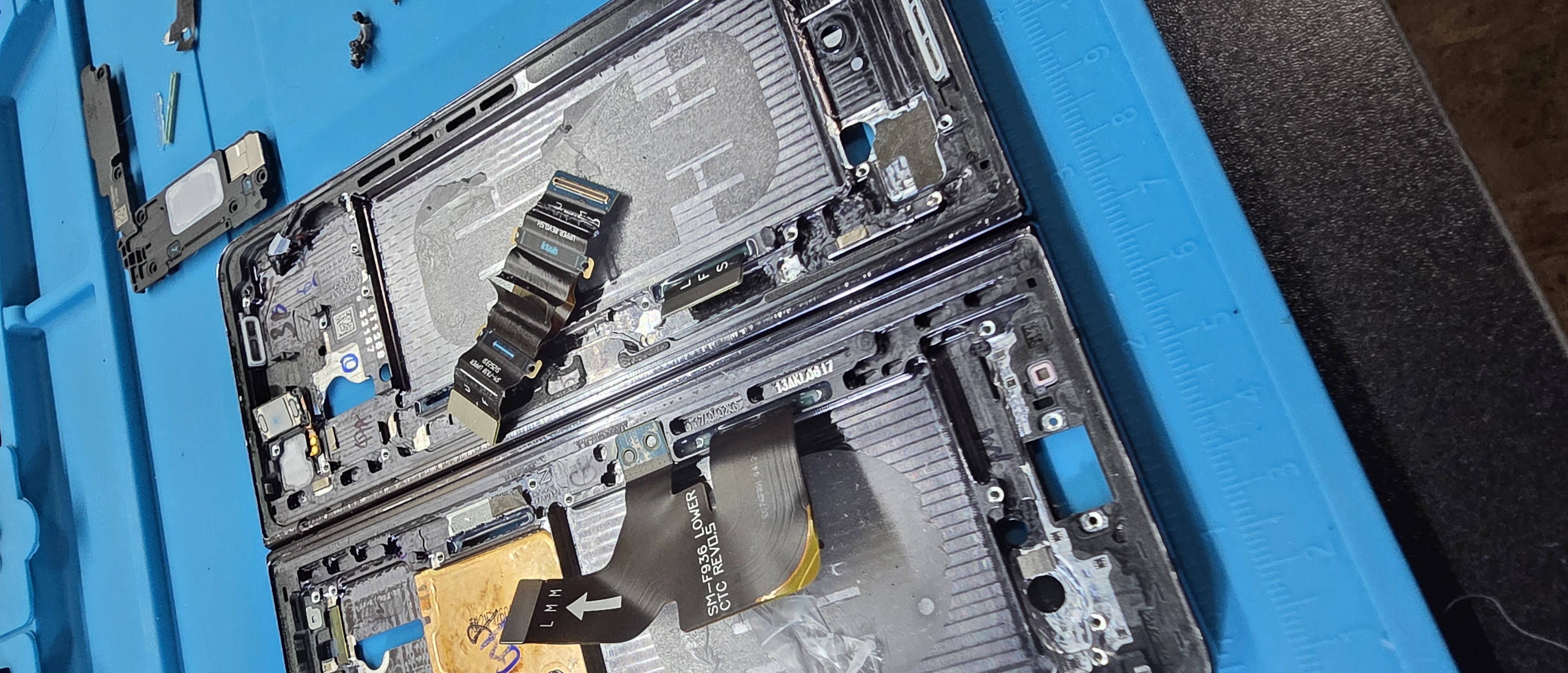 Failed Samsung Fold 4 inner screen ribbon cable on the chassis